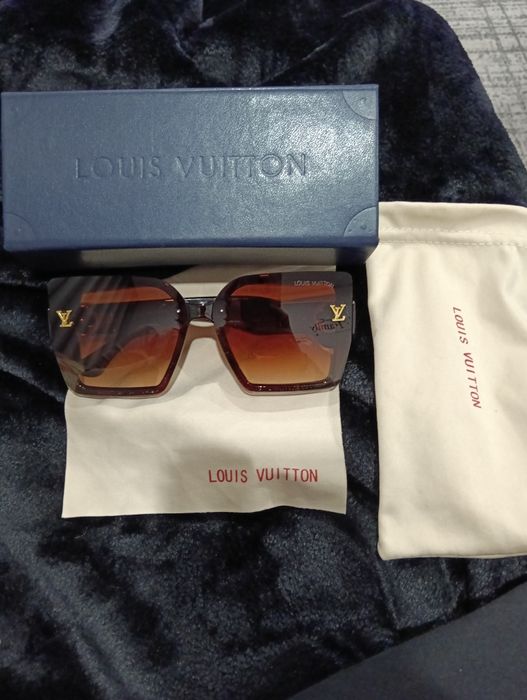 Óculos de sol castanhos