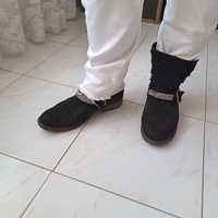 Botas com presilhas estilo cowboy ocidental