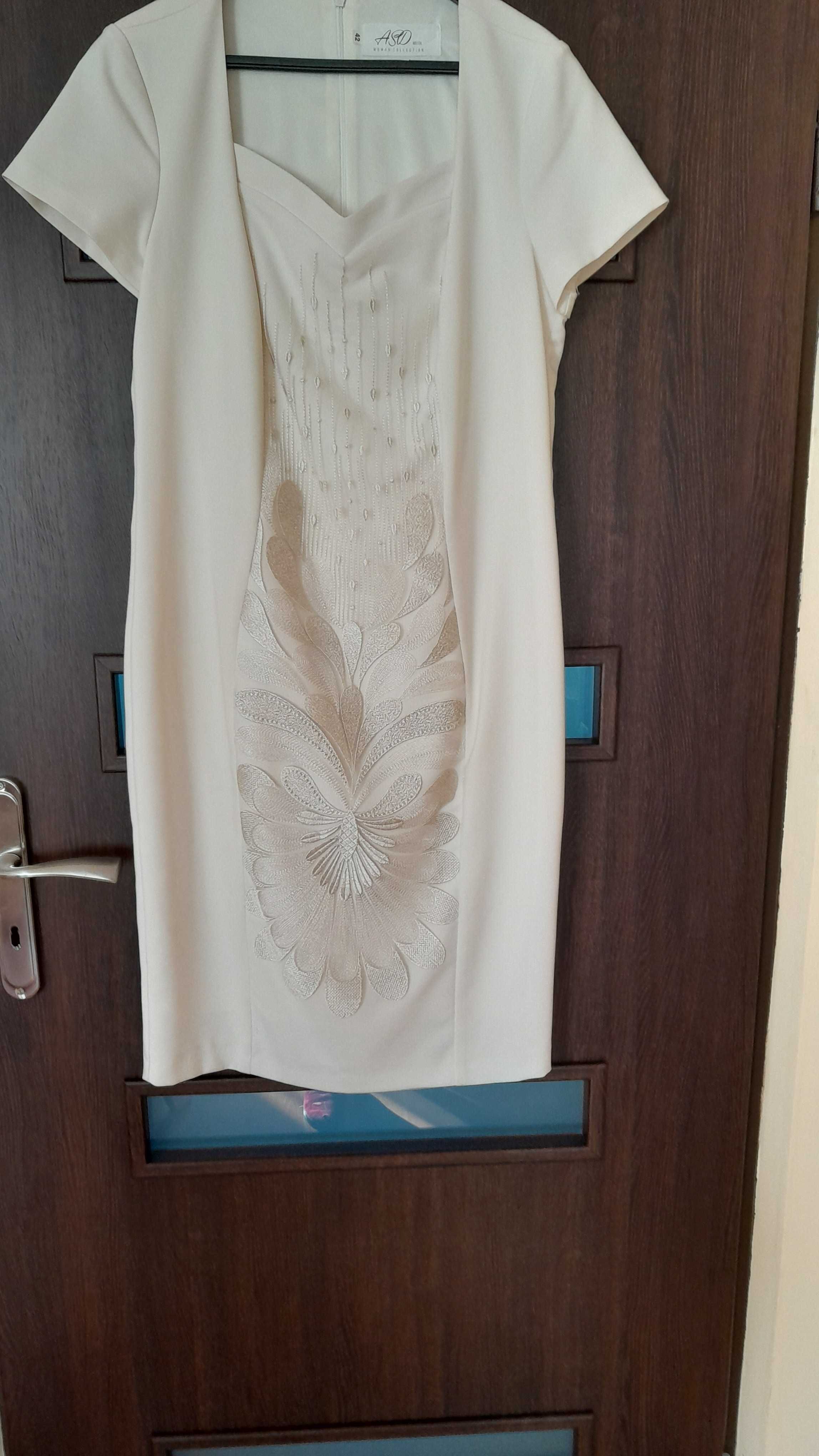 elegancka  kremowa  sukienka ze śliczną wstawką  rozm.40/42