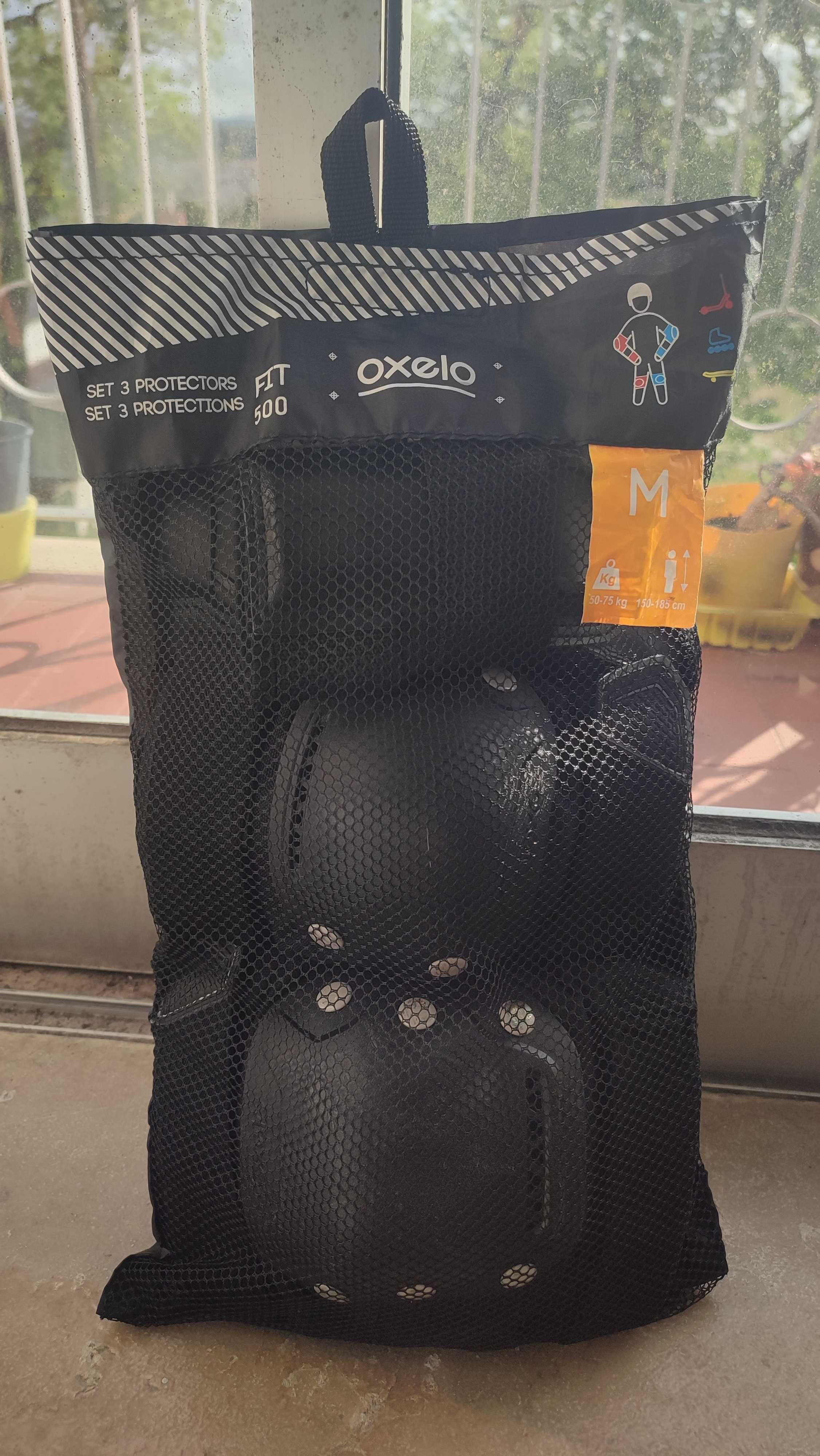 Patins da marca Oxelo + Proteções Oxelo FIT500