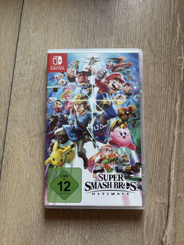 Nintendo switch oled + 2 gry mario kart i supersmash bros +akcesoria
