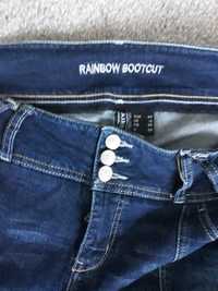 Ciemnoniebieskie jeansy z przetarciami Rainbow rozmiar 44