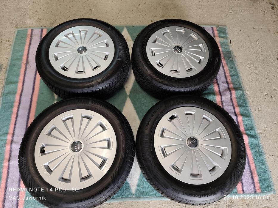 Alufelgi Kute z kołpakami Audi 8W0 5x112 7J ET35 205/60R16 Continental