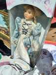Boneca grande de porcelana