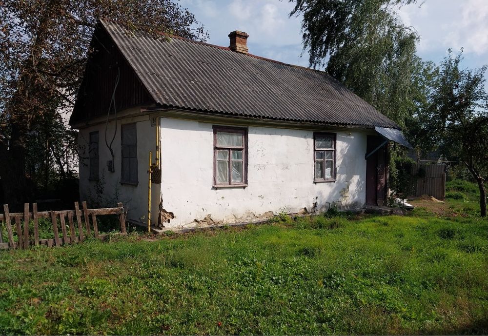 Будинок- земельна ділянка