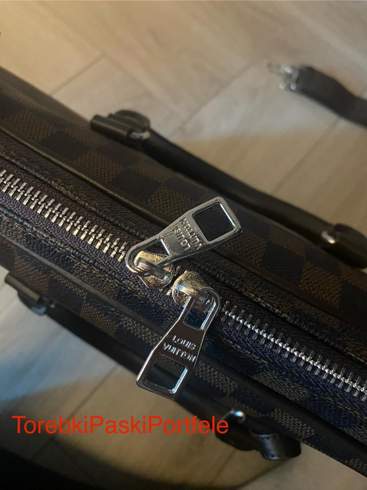 Nowa torba na laptopa Louis Vuitton.