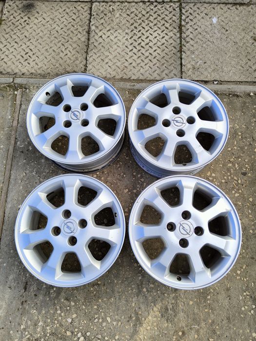 Alufelgi Opel 15 4x100, komplet, Astra, Corsa, Meriva, Adam