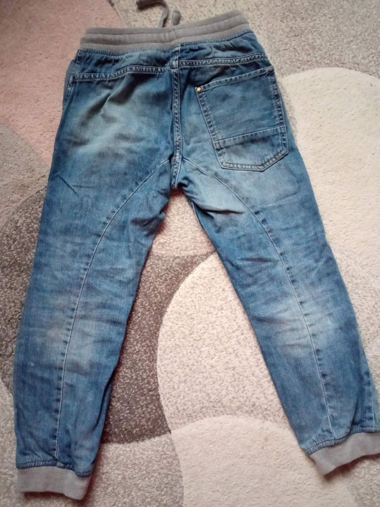 Niebieskie spodnie joggery jeansowe H&M r. 128