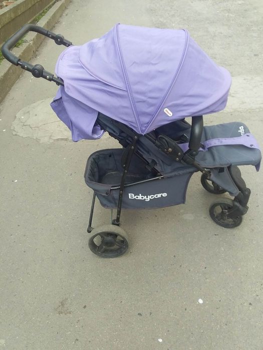 Дитяча прогулянкова коляска