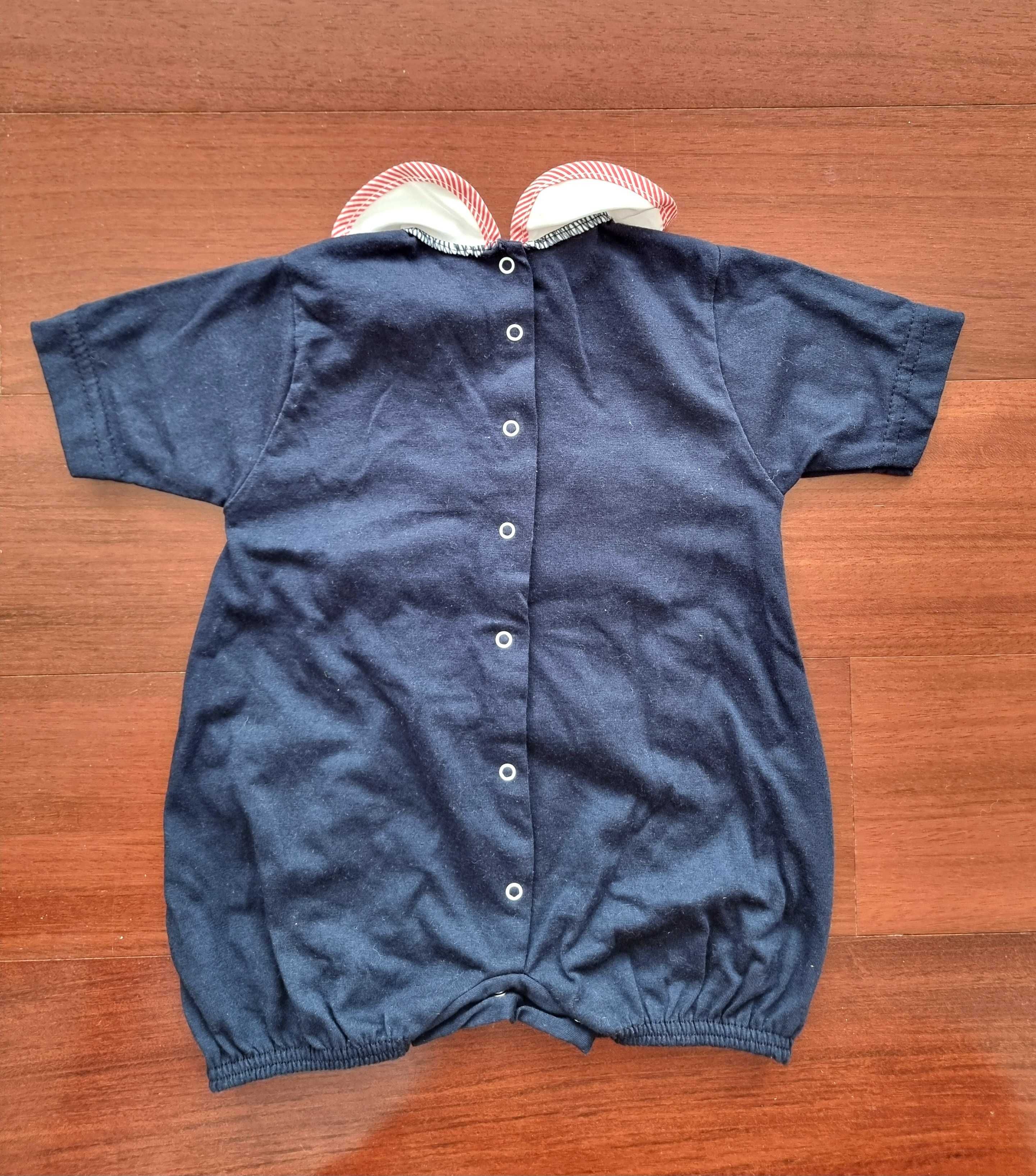 Romper azul com detalhe na gola e um urso 100% algodão, recém-nascido