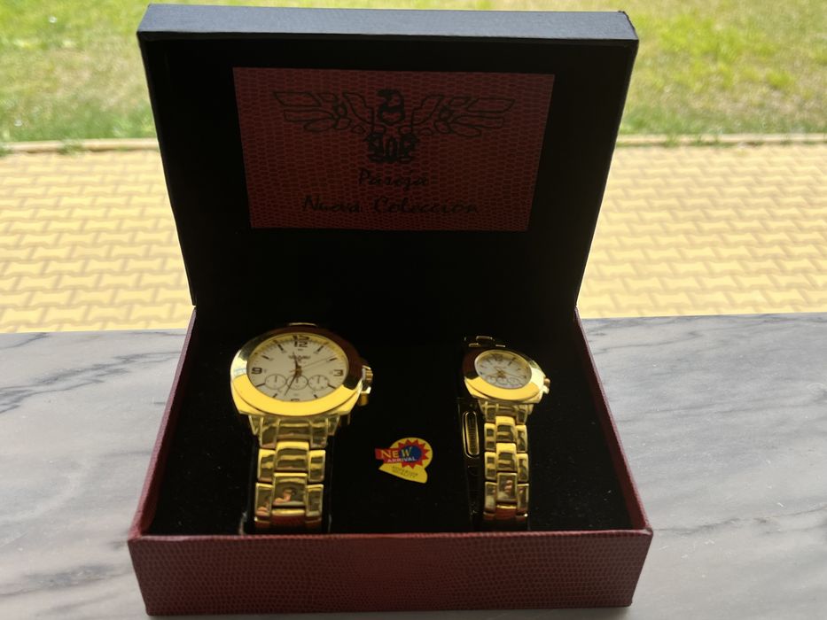 Relogios Parejas dourados