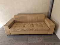 Sofa rozkładana skórzana.