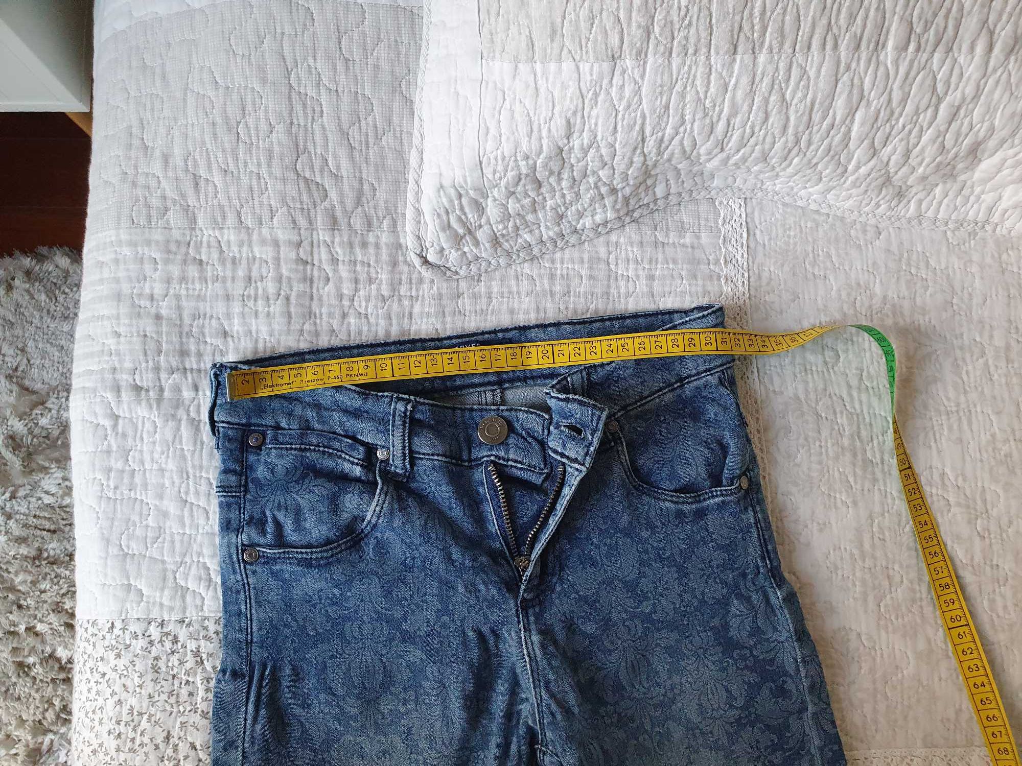 Jeansowe spodnie dziewczęce Reserved rozm.140
