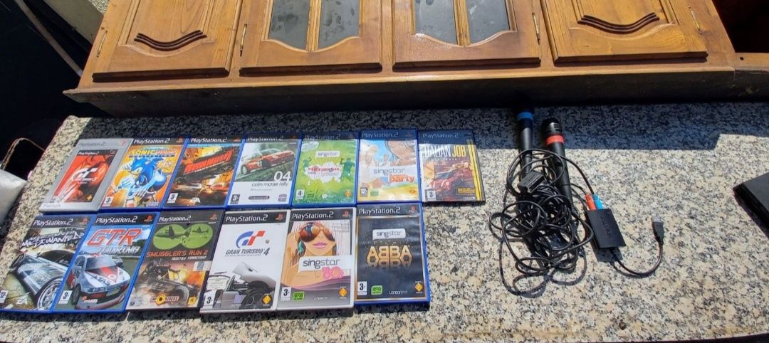 Jogos playstation 2 e sistema karaoke