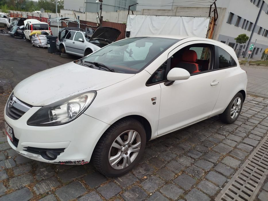 Opel Corsa D części zderzak maska klapa lampy pas przedni błotnik z474