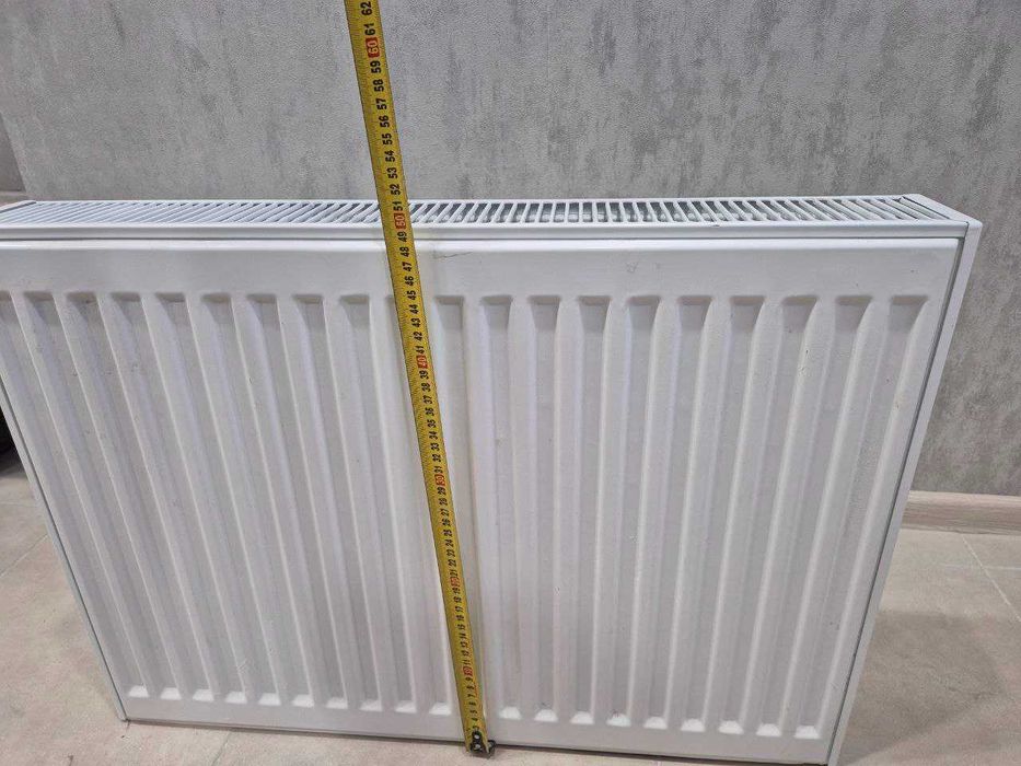 Продам металлический радиатор 70см в использовании НЕБЫЛ