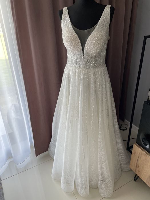 Sprzedam suknię ślubną błyszczącą M/L