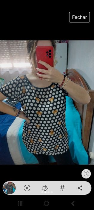 Blusa preta as bolinhas brancas tamanho M