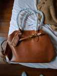Bolsa Miu Miu Aventure (castanha)