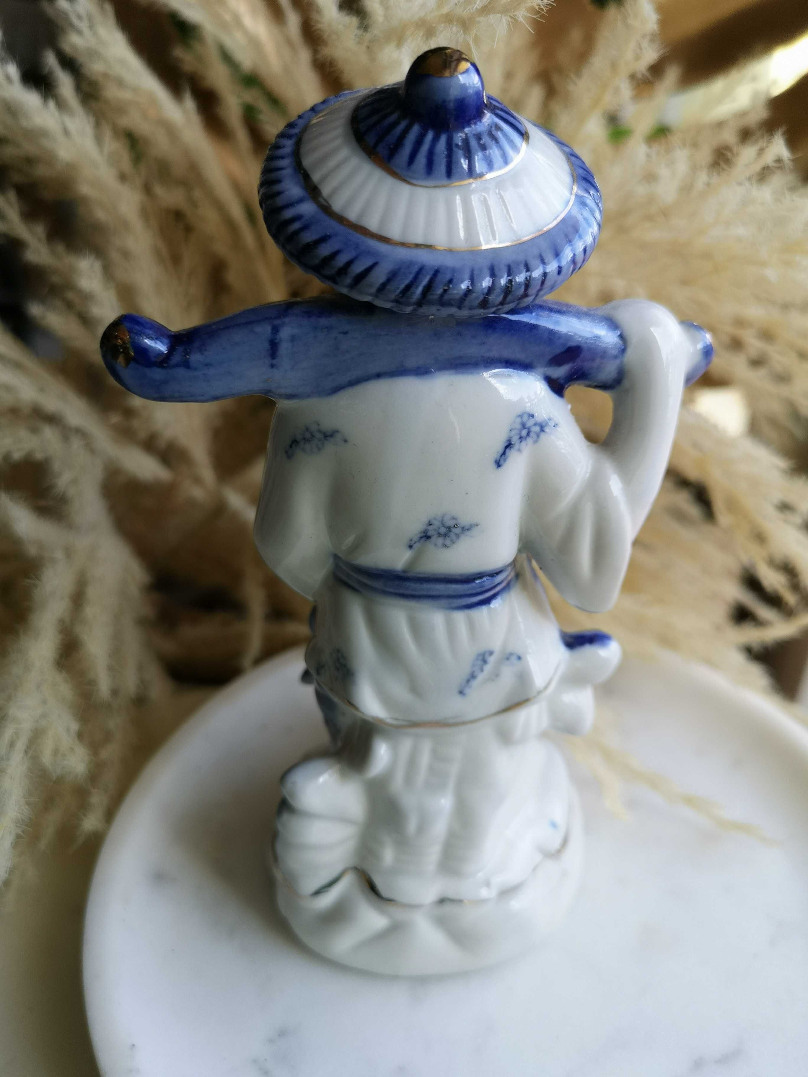 figurka porcelanowa rybak