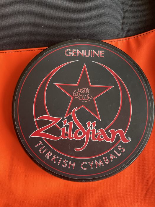 Conjunto de baquetas com pad de treino