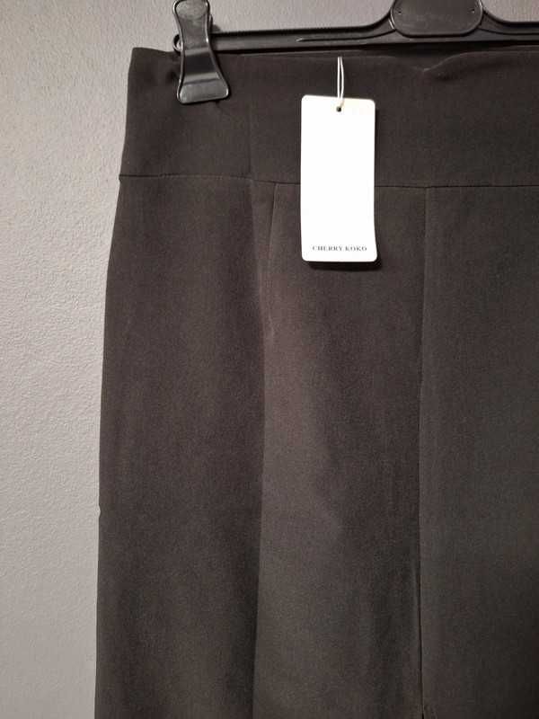 Czarna elegancka klasyczna spódnica do kolan do pracy do biura 40 L 12
