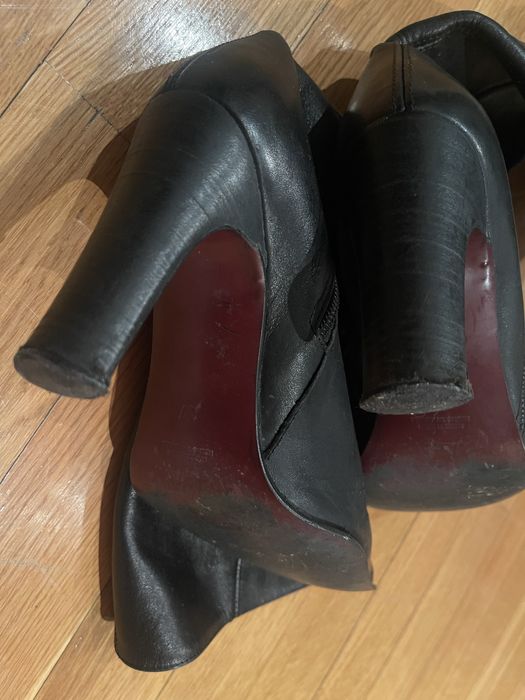 Botas em pela sintetica