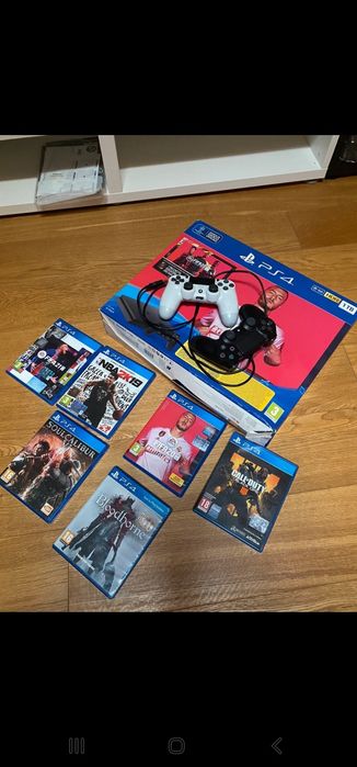 Playstation 4 1TB na Caixa + Jogos 2 comandos