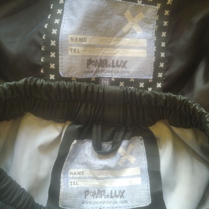 Kurtka i spodnie przeciwdeszczowe na wzrost 122/128 cm Pomp De Lux