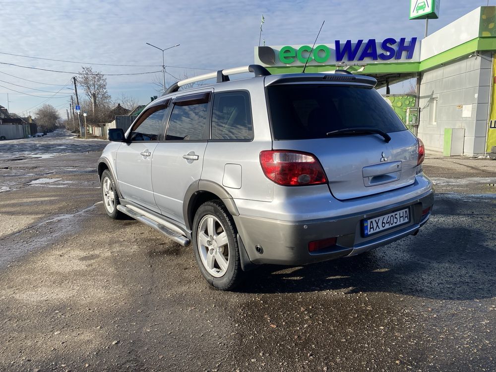 Mitsubishi outlander 2,4 АКПП газ/бензин