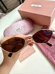 Okulary w stylu miumiu