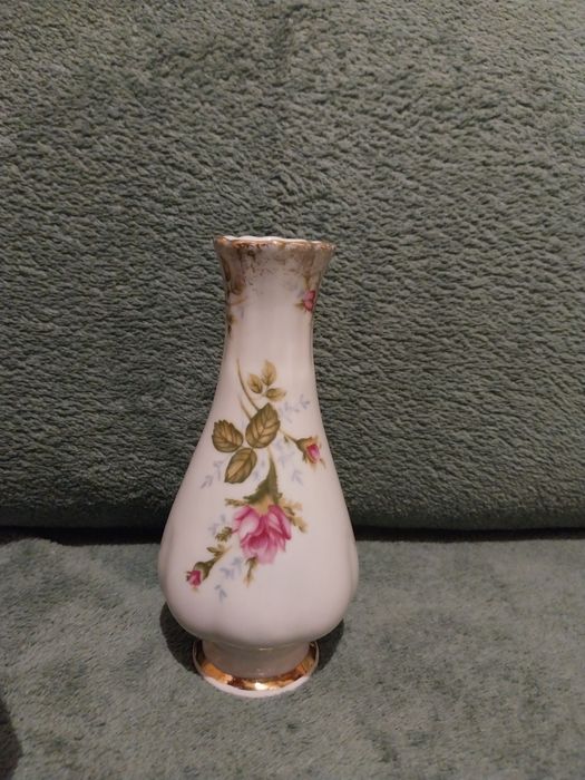 Stary wazon z kwiatem chodzież prl