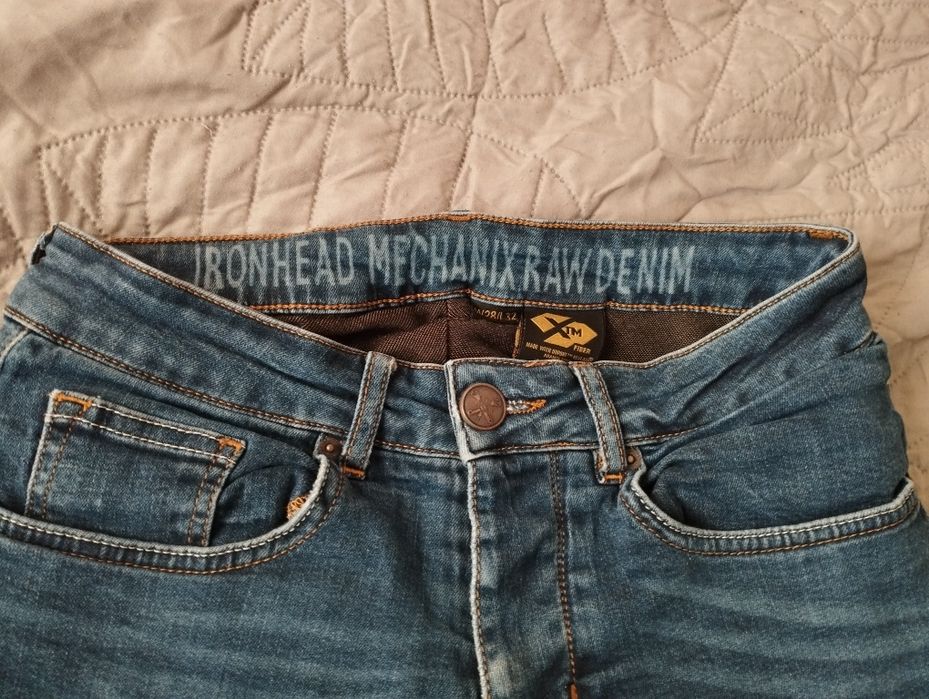 Używane męskie spodnie jeansowe John Doe Ironhead Mechanix r. W28/L32