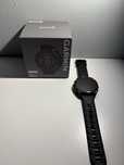 Garmin Fenix 8 AMOLED Safira 47 mm Titânio cinza carvão correia preta