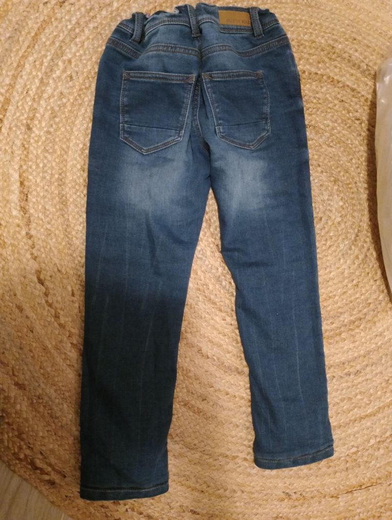 Spodnie jeansowe 122 ocieplane dla chłopca jak nowe c&a granatowe