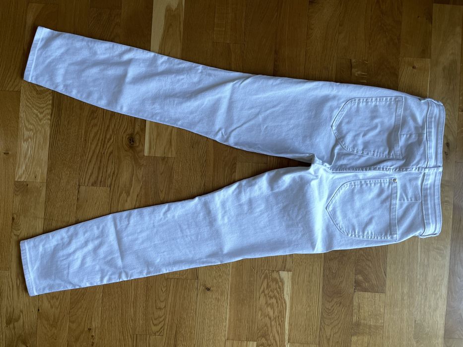 Białe spodnie jeansy skinny H&M