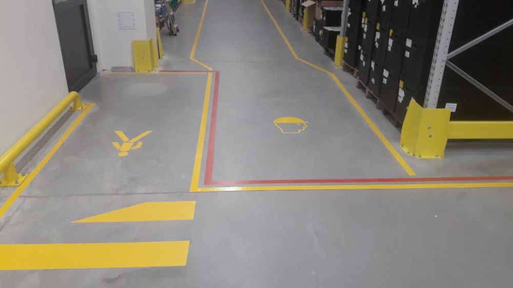 Malowanie oznakowania poziomego miejsc, kopert, linii, pasów.