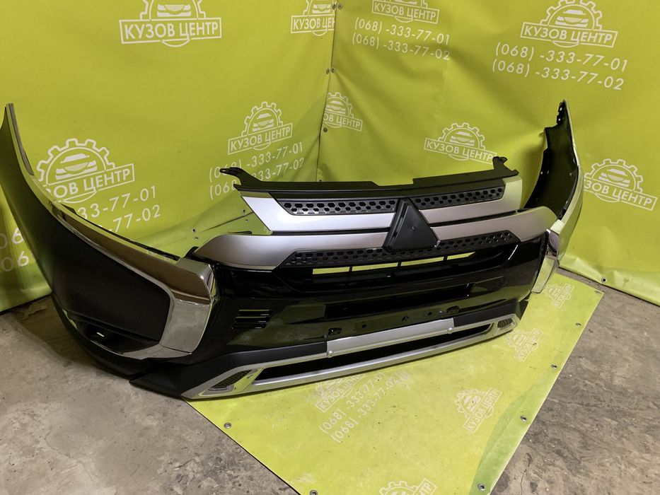 Бампер передний Mitsubishi Outlander  2018 2019 2020 2021 решетка губа