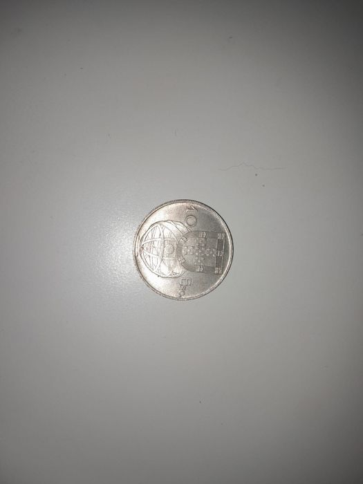 Uma moeda de 10 escudos de 1955
