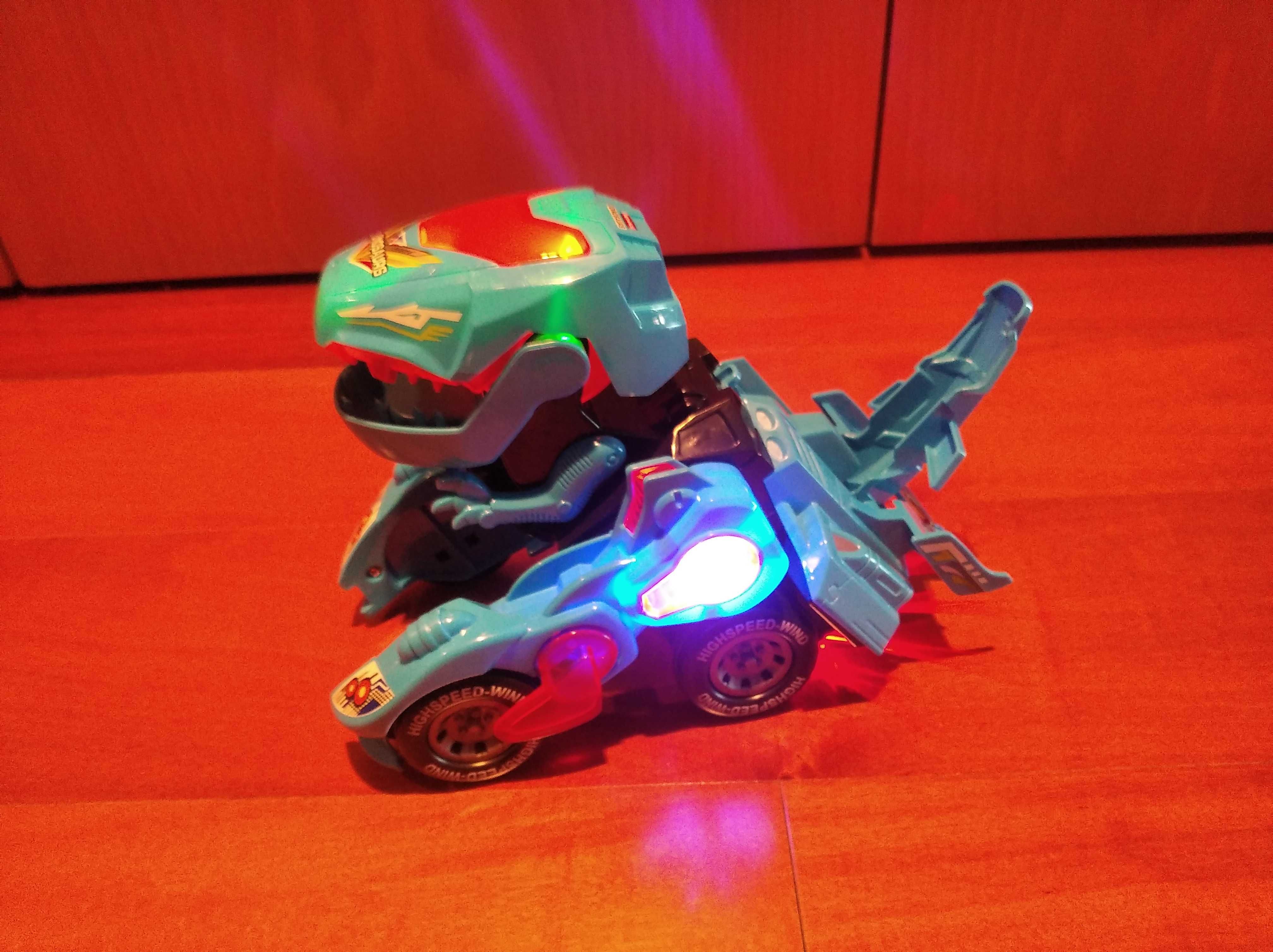Carro dinossauro com luzes e sons
