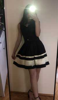 Sukienka rozkloszowana czarna krótka elegancka sukienka rozmiar 36