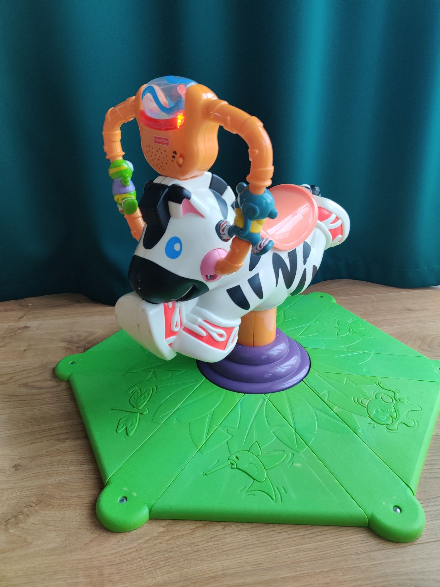 Fisher Price skoczek konik zebra, światełka, melodie