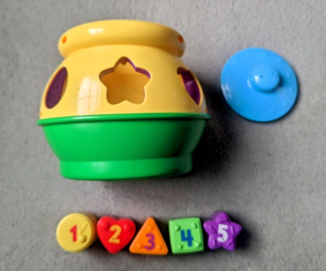 Garnuszek na klocuszek Fisher Price śpiewa po angielsku
