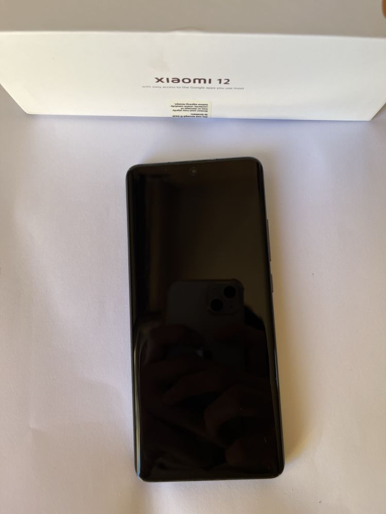 Xiaomi Redmi Note 12 128gb W/ Charger and cell phone cover