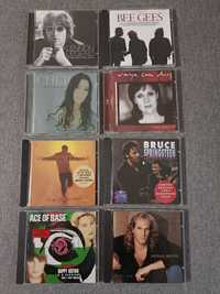 CDs de Cher, Bruce Springsteen, John Legend, etc
