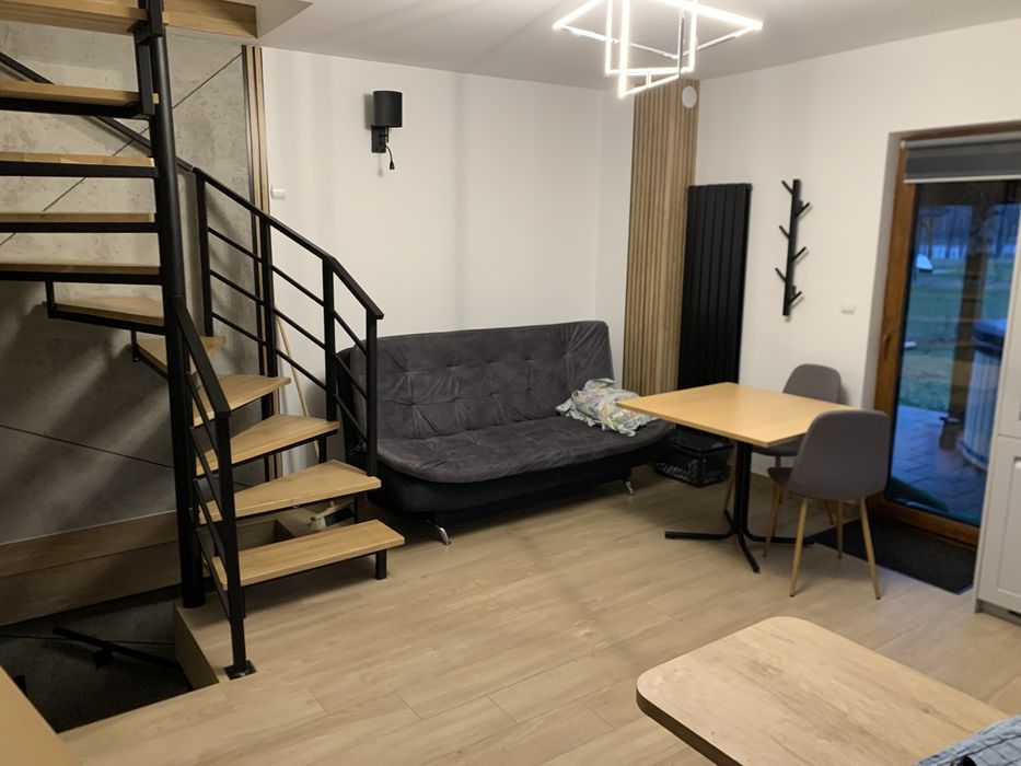 Domek całoroczny nad jeziorem z balią.