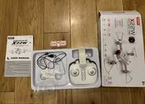 Do Syma X22W - pilot, bateria, śmigielka i ładowarka (BEZ DRONA).