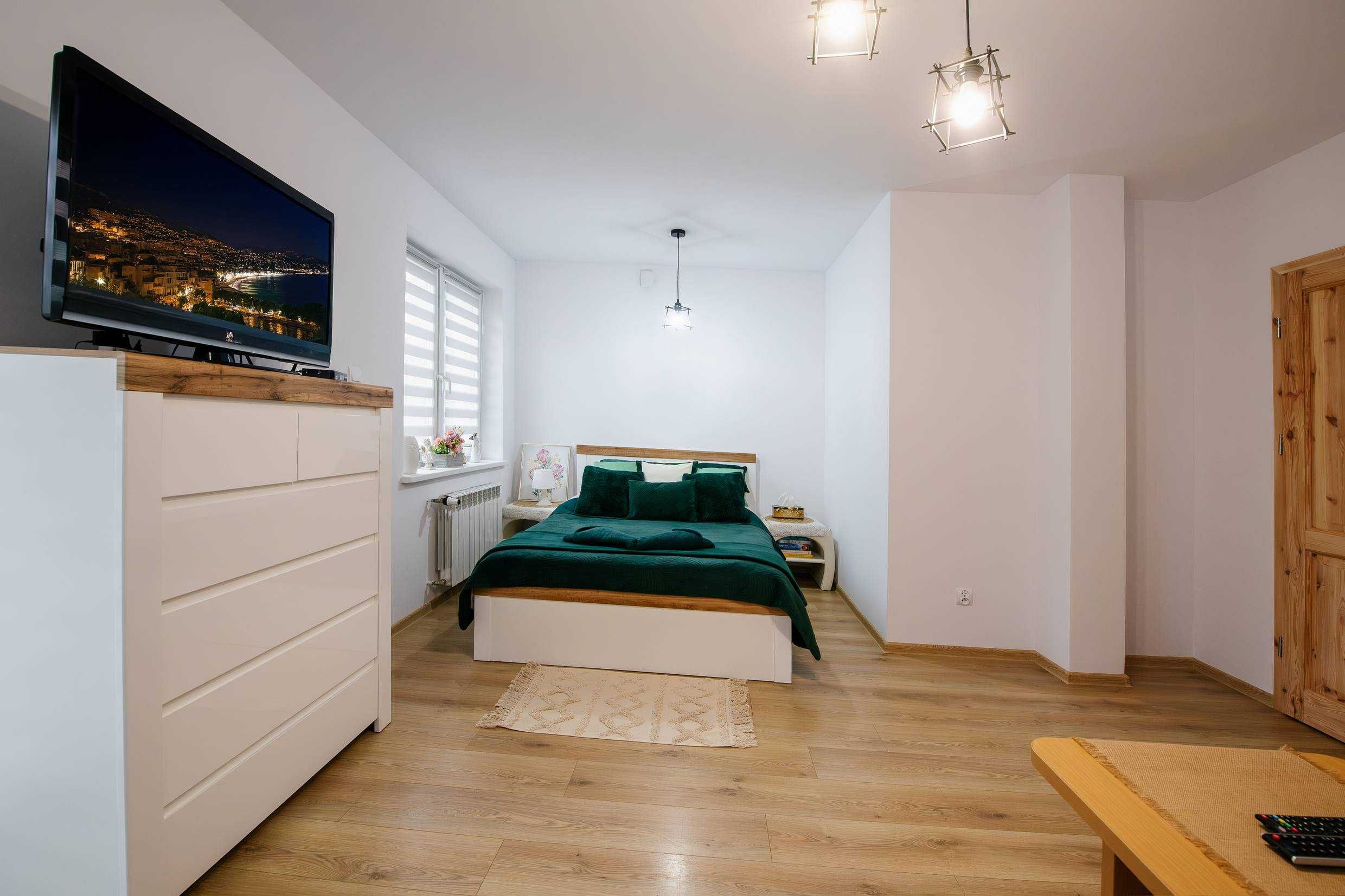 Apartament z ogródkiem. Spokojna okolica. Wynajem krótkie terminy.