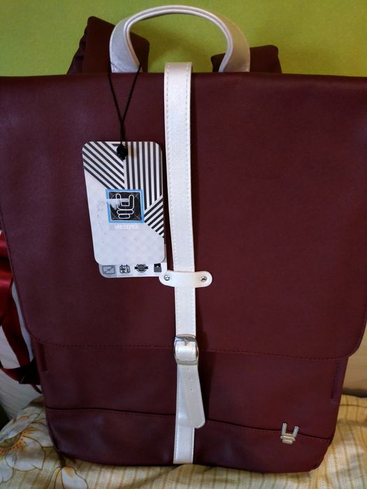 Mochilas em tecido /napa. NOVAS