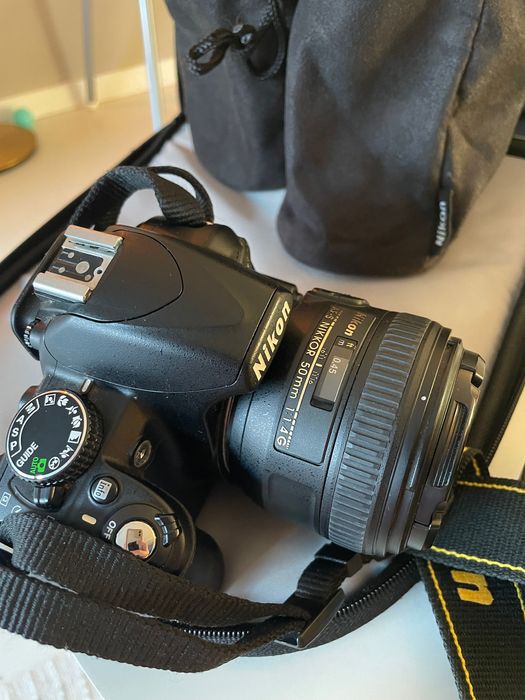 Nikon D3100+lente 50mm f/1.4+lente18-55mm+lente 55-200mm+mochila